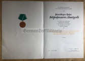 od049 - c1980 VP Police medal cert to a Freiwilliger Helfer der Volkspolizei
