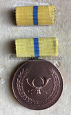 om980 - 2 - Deutsche Post - East German postal service merit medal Verdienstmedaille in Bronze