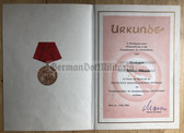 od068 - c1962 dated Kampfgruppen medal award certificate - Berlin