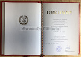 ag116 - c1988 dated award certificate for the Medaille für Verdienste in der Energiewirtschaft in bronze with folder