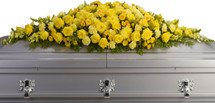 Sunny yellow roses, bright yellow spray roses, soft yellow carnations, sunshine yellow chrysanthemums, snapdragons and more are arranged in a dazzling full casket spray called The Golden Garden Casket spray.
