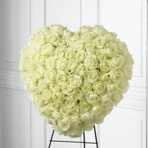 The FTD® Elegant Remembrance™ Standing Heart is an exquisite display of peace and love. 77 Stems of white roses are artfully arranged in the shape of a heart