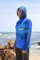 Lightweight quick-dry fishing hoodie being worn in the Australian sun - ARPANSA certified.