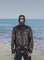 Lightweight quick-dry sun safe hoodie being worn in the Australian sun - ARPANSA certified.