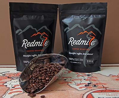 Coffee beans in bags by Redmile