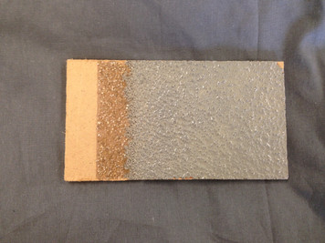 EP Primer with Surfacing Sand, EP-FR Finish, Stone Grey with exposed masonite - 3x5"