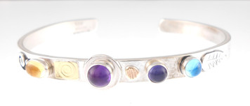 A PROTECT THIS WOMAN BRACELET, AMETHYST 