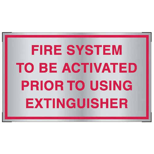 Photograph of the Aluminum fire system activation sign for cooking system fire control systems.