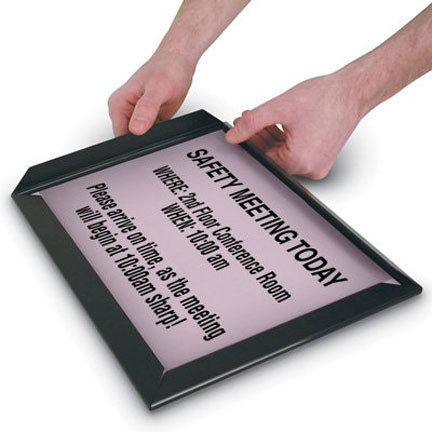 Picture of black plastic snap on frame in use on a sign.