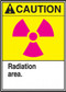 This sign has an ANSI CAUTION header on a yellow background, a magenta international radiation symbol, and a white text box with "Radiation area." in black text.