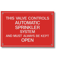 Red sign with white lettering reads THIS VALVE CONTROLS AUTOMATIC SPRINKLER SYSTEM AND MUST ALWAYS BE KEPT OPEN.