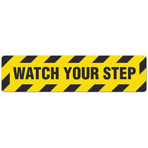 Photograph of an anti-slip floor safety sign reading "Watch Your Step" in black on a yellow background. 
