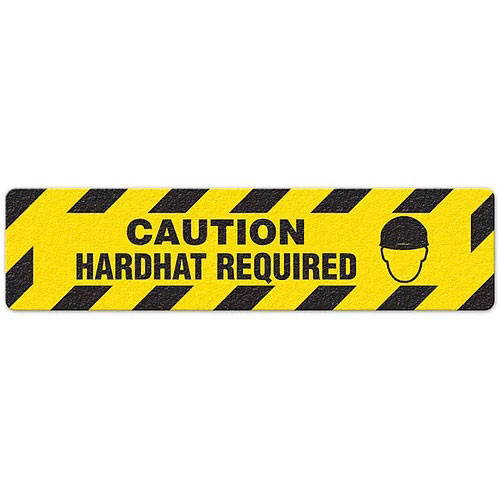 Photograph of an anti-slip floor safety sign reading "Caution Hardhat Required" in black on a yellow background.  Includes a graphic of a head wearing a hardhat.