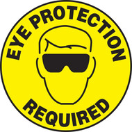An image of a Slip-Gard™ Floor Sign.  This yellow sign has "EYE PROTECTION REQUIRED" in black lettering around circumference of the sign with a graphic of a face with safety glasses in the center.