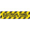 Photograph of an anti-slip floor safety sign reading "Electrical Panel Keep Clear 36 Inches" in black on a yellow background. 