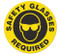 A photograph of a 05231 anti-slip safety floor markers, reading safety glasses required with graphic.