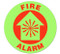A red and green photograph of a 05235 anti-slip safety floor markers, reading fire alarm with graphic.