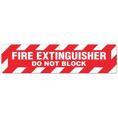 Photograph of an anti-slip floor safety sign reading "Fire Extinguisher Do Not Block" in white on a red background.  