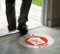 Photograph of floor marker in use on floor at a facility.