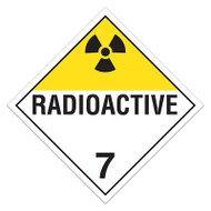 A yellow and white photograph of a 03119 class 7 dot hazardous material placards, reading radioactive 7 with graphic.