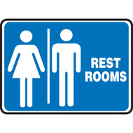 A blue and white photograph of a 03456 restroom signs with male and female graphics.
