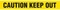 A drawing of the unrolled tape showing words CAUTION KEEP OUT in black on yellow.