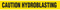 A drawing of an unrolled section of tape showing "CAUTION HYDROBLASTING" in black on yellow.