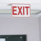 A picture of the Drop Ceiling Double-Faced Aluminum Exit Sign installed in a ceiling grid.