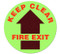 A photograph of green and black 05239 anti-slip safety floor markers, reading keep clear fire exit with arrow graphic.