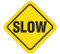 A photograph of yellow and black 05262 anti-slip safety floor markers, reading slow.