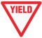 A photograph of red and white 05263 anti-slip safety floor markers, reading yield, with triangle shape.