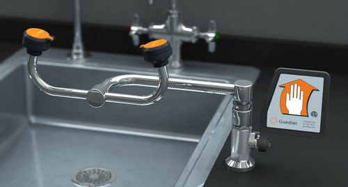 A photograph of a Guardian G1806 Eyewash, Deck Mounted, 90º Swivel mounted to the right of a sink (sink is not included).