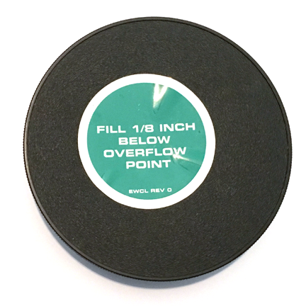A photograph of the top of a G1540CP Replacement Cap For Guardian G1540 Eye Washes.