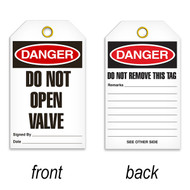 A photograph of a 07087 tag, reading danger do not open valve on front, and do not remove this tag on back, with 25 per package.