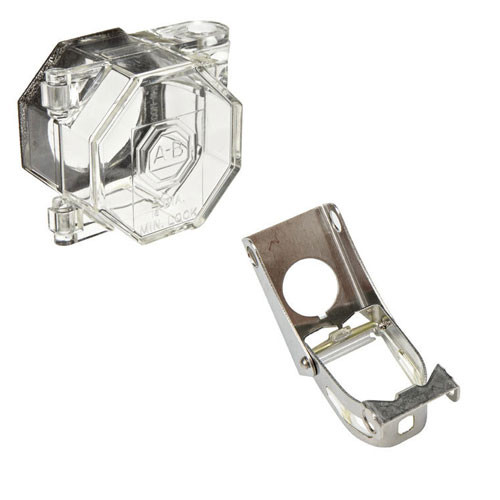 A photograph of a 07151 push button safety cover lockout devices, both clear and metal.