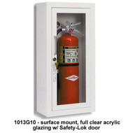 A photograph of a 09320 ambassador steel trim and door fire cabinet with fire extinguisher installed.