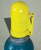 A photograph of back of a yellow 07200 justrite safety snap cap heavy-duty gas cylinder lockout device with padlock in closed position.