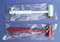 A photograph of a red and a white 09423 replacement hammer assemblies for cato and firetech extinguisher cabinets.