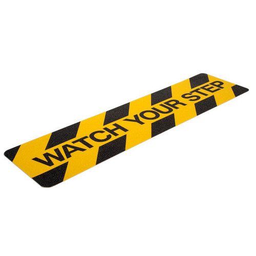 A photograph of a yellow and black 06459 anti-slip stair cleats, reading watch your step, with 6" x 24" dimensions and 10 per package.
