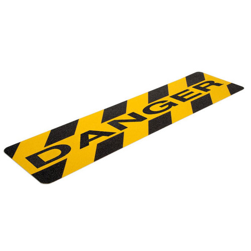 A photograph of a yellow and black 06461 anti-slip stair cleat,  reading danger, with 6" x 24" dimensions, and 10 per package.