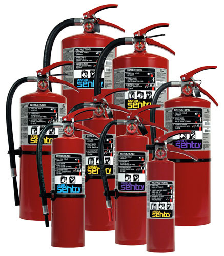 A group photo of various assorted Ansul Sentry dry chemical extinguishers.