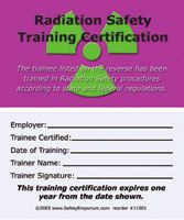 A photograph of front and back of a purple 11501 radiation safety training certification card.