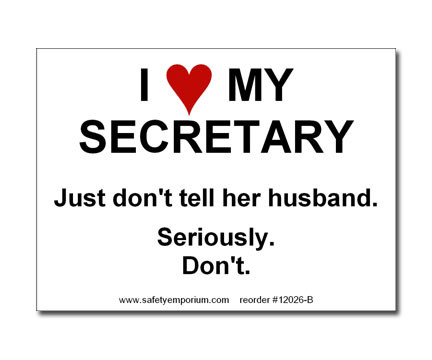A photograph of a 12026 witty workplace label reading I love my secretary just don't tell her husband seriously don't.