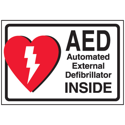 A photograph of a 13009 AED label reading AED automatic external defibrillator inside with graphic.