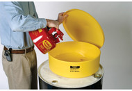 A photograph of a 04320 55 gallon drum funnel in use on a drum.