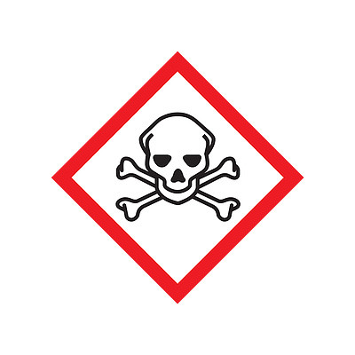 A photograph of a 03605 GHS skull and crossbones pictogram label.