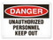 A photograph of a 01641 danger, unauthorized personnel keep out OSHA sign.