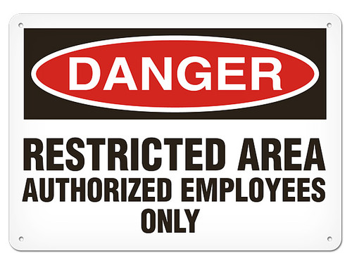 A photograph of a 01630 danger, restricted area authorized employees only OSHA sign.