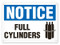 A photograph of a 01574 notice full cylinders OSHA sign with chained cylinders icon.