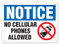 A photograph of a 03196 notice no cellular phones allowed OSHA sign with phone prohibition icon.